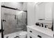 Modern bathroom with a walk-in shower and a floating vanity at 1606 Hart Ln, Orlando, FL 32804