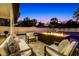 Cozy fire pit area, perfect for enjoying evenings outdoors at 1606 Hart Ln, Orlando, FL 32804