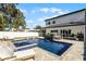 Relax by the pool with a spacious patio and lounge chairs at 1606 Hart Ln, Orlando, FL 32804
