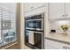 Double oven and microwave combo in a modern kitchen at 1801 Lobelia Dr, Lake Mary, FL 32746