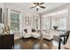 Living area with comfy seating and hardwood floors at 1801 Lobelia Dr, Lake Mary, FL 32746
