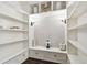 Built-in shelving unit with drawers and decorative accents at 1801 Lobelia Dr, Lake Mary, FL 32746