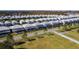 Community overview showcasing numerous homes and green spaces at 2477 Shanti Dr, Kissimmee, FL 34746