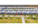 Aerial view of a house with a pool and screened enclosure at 2477 Shanti Dr, Kissimmee, FL 34746