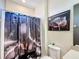 Bathroom with Batman themed shower curtain at 2477 Shanti Dr, Kissimmee, FL 34746