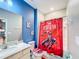 Bathroom with Spider-Personal themed shower curtain at 2477 Shanti Dr, Kissimmee, FL 34746