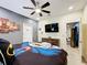 Bedroom with Batman theme and large TV at 2477 Shanti Dr, Kissimmee, FL 34746