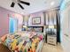 Disney themed bedroom with a king-size bed and charming decor at 2477 Shanti Dr, Kissimmee, FL 34746