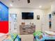 Super Mario themed bedroom with twin beds, dresser, and large TV at 2477 Shanti Dr, Kissimmee, FL 34746