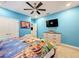 Disney Princess themed bedroom with a large bed and TV at 2477 Shanti Dr, Kissimmee, FL 34746