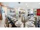 Large dining room table with seating for many at 2477 Shanti Dr, Kissimmee, FL 34746