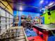 Fun game room with arcade games, foosball, and pool table at 2477 Shanti Dr, Kissimmee, FL 34746