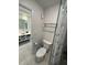 Clean bathroom with toilet, shower, and modern vanity at 5245 W Irlo Bronson Memorial Hwy # 215, Kissimmee, FL 34746