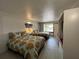 Spacious bedroom with two double beds and access to balcony at 5245 W Irlo Bronson Memorial Hwy # 215, Kissimmee, FL 34746