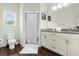 Bathroom with granite countertop, shower, and toilet at 5368 Diplomat Ct # 104, Kissimmee, FL 34746
