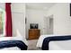 Bedroom with two twin beds and dresser at 5368 Diplomat Ct # 104, Kissimmee, FL 34746