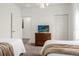 Bedroom with two twin beds and dresser at 5368 Diplomat Ct # 104, Kissimmee, FL 34746