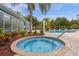 Relaxing community hot tub with surrounding landscaping at 5368 Diplomat Ct # 104, Kissimmee, FL 34746