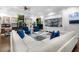 Relaxing lounge area with comfortable seating and a large TV at 5368 Diplomat Ct # 104, Kissimmee, FL 34746