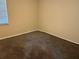 Simple carpeted bedroom with neutral walls at 602 Mesilla Dr, Kissimmee, FL 34758
