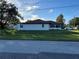 Single story home with screened patio and spacious backyard at 602 Mesilla Dr, Kissimmee, FL 34758