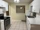 Kitchen with stainless steel appliances and breakfast bar at 602 Mesilla Dr, Kissimmee, FL 34758