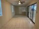 Living room featuring sliding glass doors and tile floor at 602 Mesilla Dr, Kissimmee, FL 34758