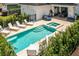 Inviting rectangular pool with spa and lounge area at 7423 Sparkling Ct, Reunion, FL 34747