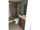 Clean bathroom with shower, toilet and vanity at 114 Scottsdale Sq # 114, Winter Park, FL 32792