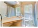 Clean bathroom with updated vanity and shower at 1321 Lakeview Dr, Winter Park, FL 32789