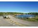 Gated community entrance with a beautiful lake view at 149 Springberry Ct, Daytona Beach, FL 32124