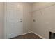 Laundry room with washer/dryer hookups and wire shelving at 149 Springberry Ct, Daytona Beach, FL 32124