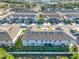 Townhouse community view from above, highlighting the building's rear at 1592 Wynford Cir, Tavares, FL 32778