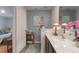 Bathroom with single vanity, view of bedroom at 1592 Wynford Cir, Tavares, FL 32778