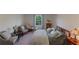 Spacious bedroom with a large bed and tranquil view at 1592 Wynford Cir, Tavares, FL 32778