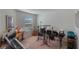 Room with keyboard, guitar, and recording equipment at 1592 Wynford Cir, Tavares, FL 32778