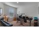 Room with keyboard, guitar, and recording equipment at 1592 Wynford Cir, Tavares, FL 32778