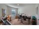 Room with keyboard, guitar, and recording equipment at 1592 Wynford Cir, Tavares, FL 32778