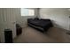 Bedroom with carpet, a bed, and plenty of natural light at 1695 Lee Rd # B216, Winter Park, FL 32789