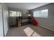 bedroom with bunk beds, slide, and ample natural light at 1695 Lee Rd # B216, Winter Park, FL 32789