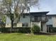 Well-maintained condo building with balcony and landscaping at 1695 Lee Rd # B216, Winter Park, FL 32789