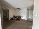 Living room with carpeted floors and a ceiling fan at 1695 Lee Rd # B216, Winter Park, FL 32789