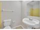 Clean bathroom with pedestal sink, shower, and toilet at 1985 Eustace Ave, Deltona, FL 32725