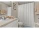 Clean bathroom with a shower/tub combo and vanity at 2361 Silver Palm Dr, Kissimmee, FL 34747