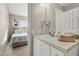 Bathroom with a vanity and a view of a bedroom at 2361 Silver Palm Dr, Kissimmee, FL 34747