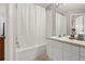 Clean bathroom with a tub shower combination and vanity at 2361 Silver Palm Dr, Kissimmee, FL 34747