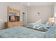 Bedroom with two twin beds and a dresser at 2361 Silver Palm Dr, Kissimmee, FL 34747