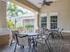 Relaxing community patio with tables and chairs, perfect for outdoor gatherings at 2361 Silver Palm Dr, Kissimmee, FL 34747
