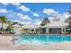 Inviting community pool with lounge chairs and a clubhouse at 2361 Silver Palm Dr, Kissimmee, FL 34747