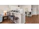 Kitchen with breakfast bar and seating for three at 2361 Silver Palm Dr, Kissimmee, FL 34747